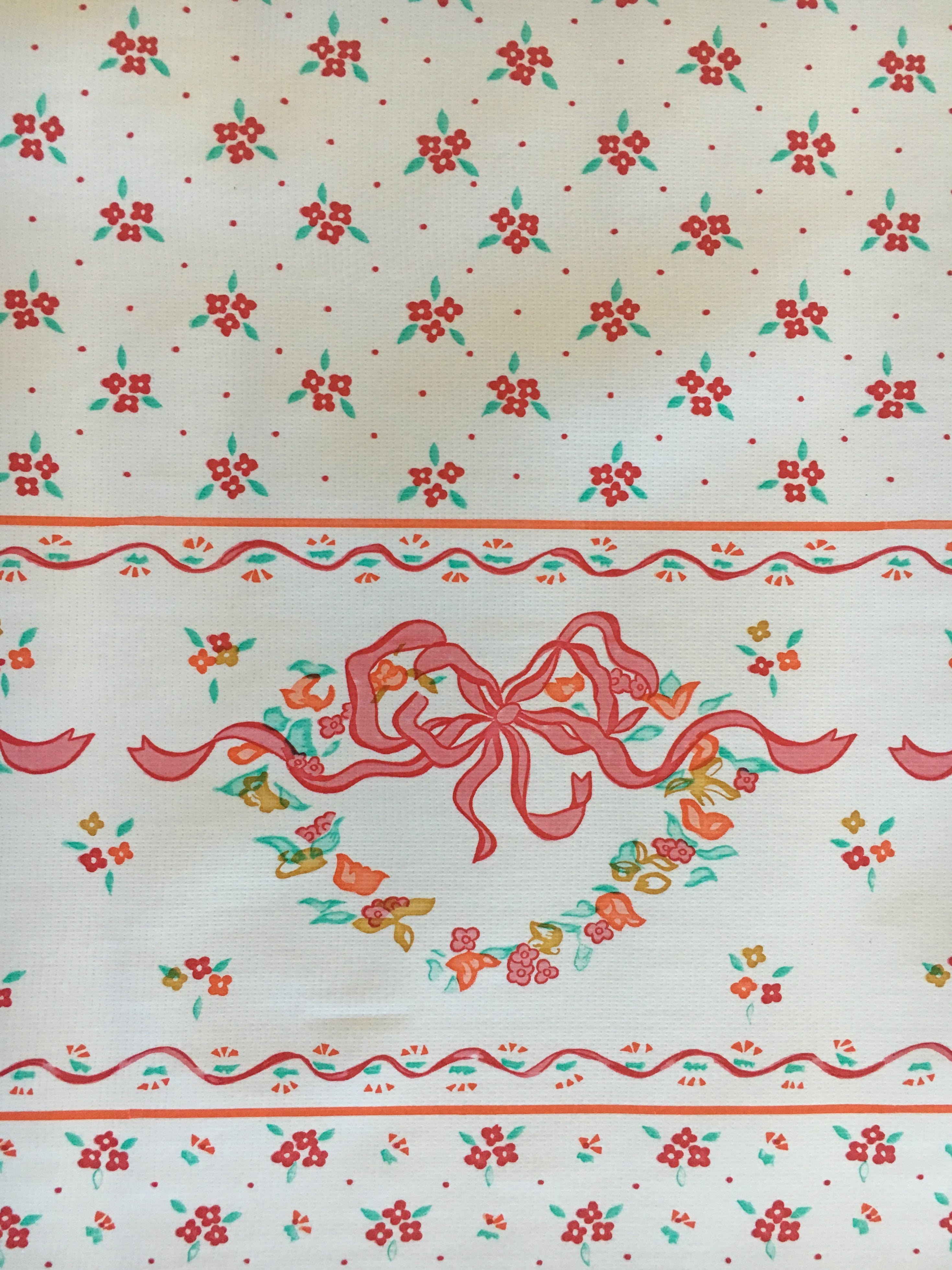 Red Ribbons & Flowers on solid white oilcloth Swatch